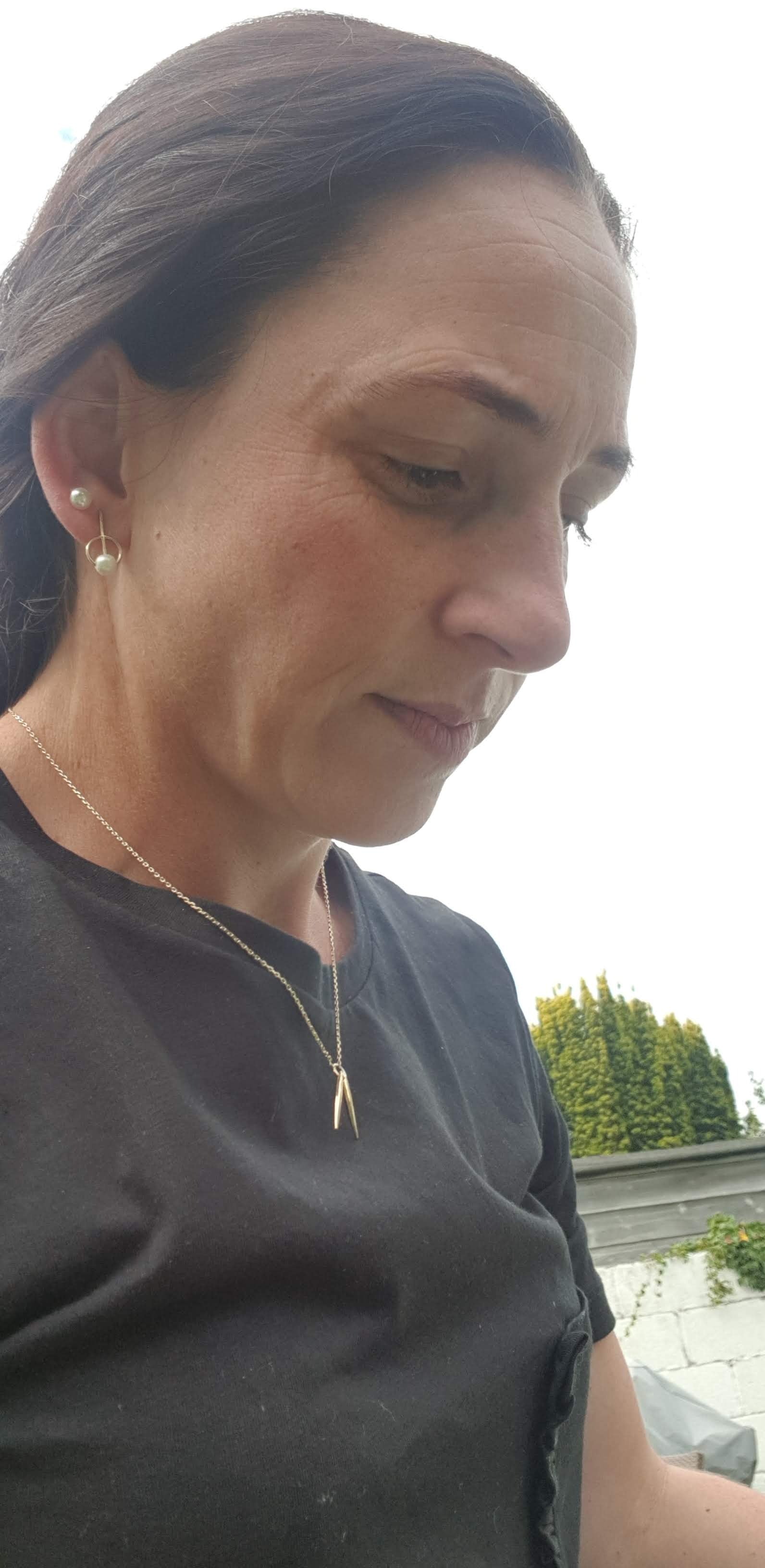 Mum using breathwork to calm her nervous system after sleep deprivation