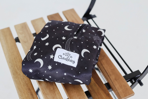 Buggy Sunshade folded on chair